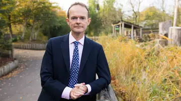 A headshot of Dominic Jermey at London Zoo