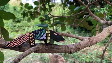 Black carved balintong (pangolin) made by members of indigenous peoples in Palawan 