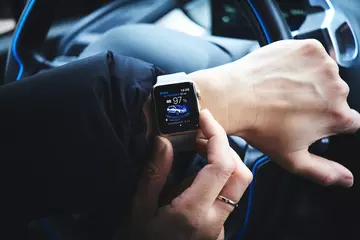 A smart watch on a wrist is an example of a miniature device