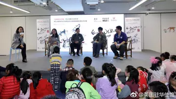 5 speakers in a panel presenting to children on pangolins