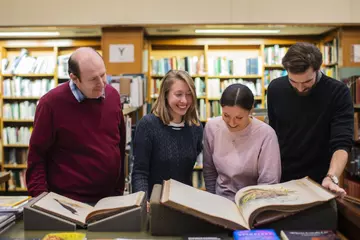 group of students reading in ZSL library