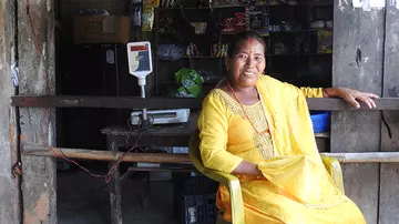woman at her shop in Nepal
