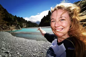 Sarah Fowkes with lake and mountains in background