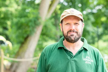 Zookeeper on green background