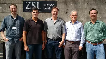Mark Stanley Price with four other men at London Zoo's Nuffield building