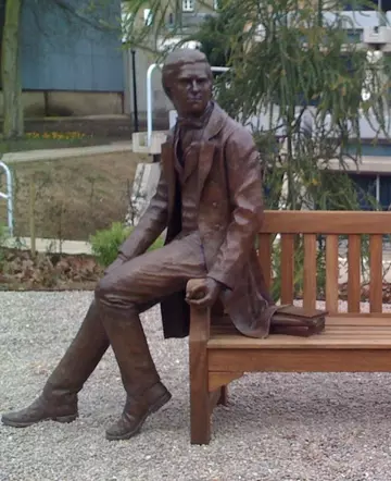 Darwin as a student at Christ's College. Sculpture by Anthony Smith.