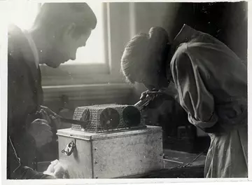 Photo of Joan Procter conducting surgery 