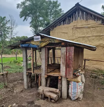 A roofed enclosure designed to protect livestock from tiger attacks