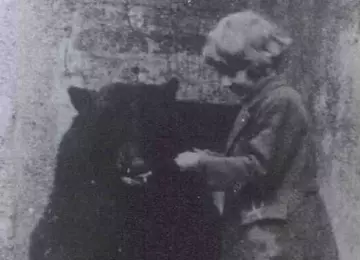 Christopher Robin Milne and Winnie the bear at London Zoo