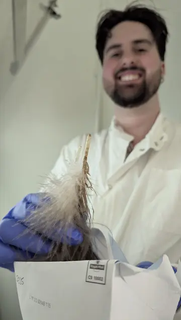 Manus Leidi with feather