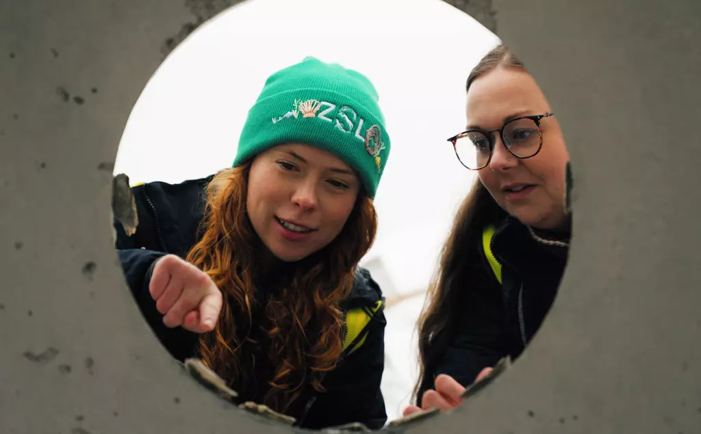 ZSL's Celine Gamble and Groundwork's Ashleigh Tinlin-Mackenzie with native oysters attached to oyster reef cubes ahead of their deployment in North Sea