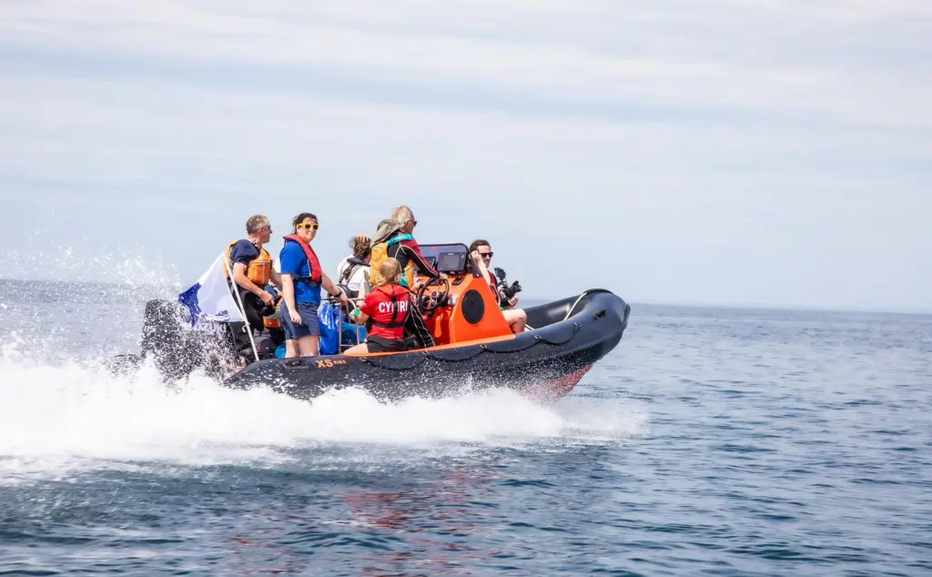 Boat on water as part of Kings Baton Relay