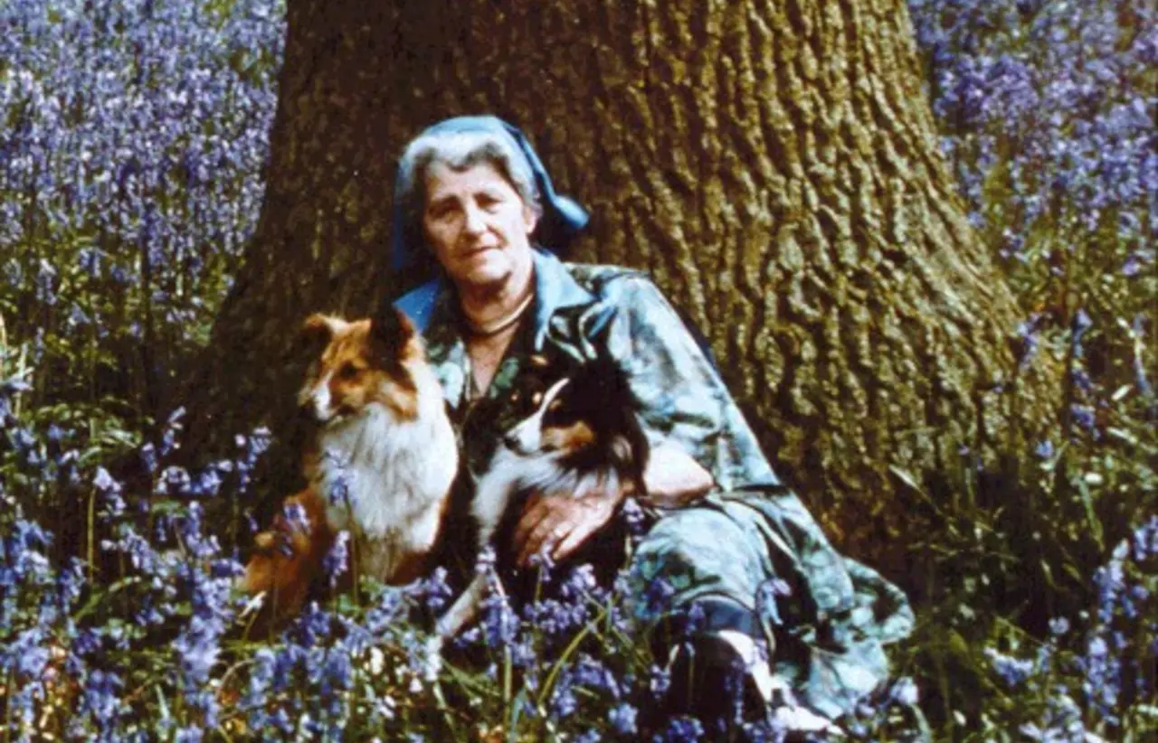 Miriam Rothschild with two dogs