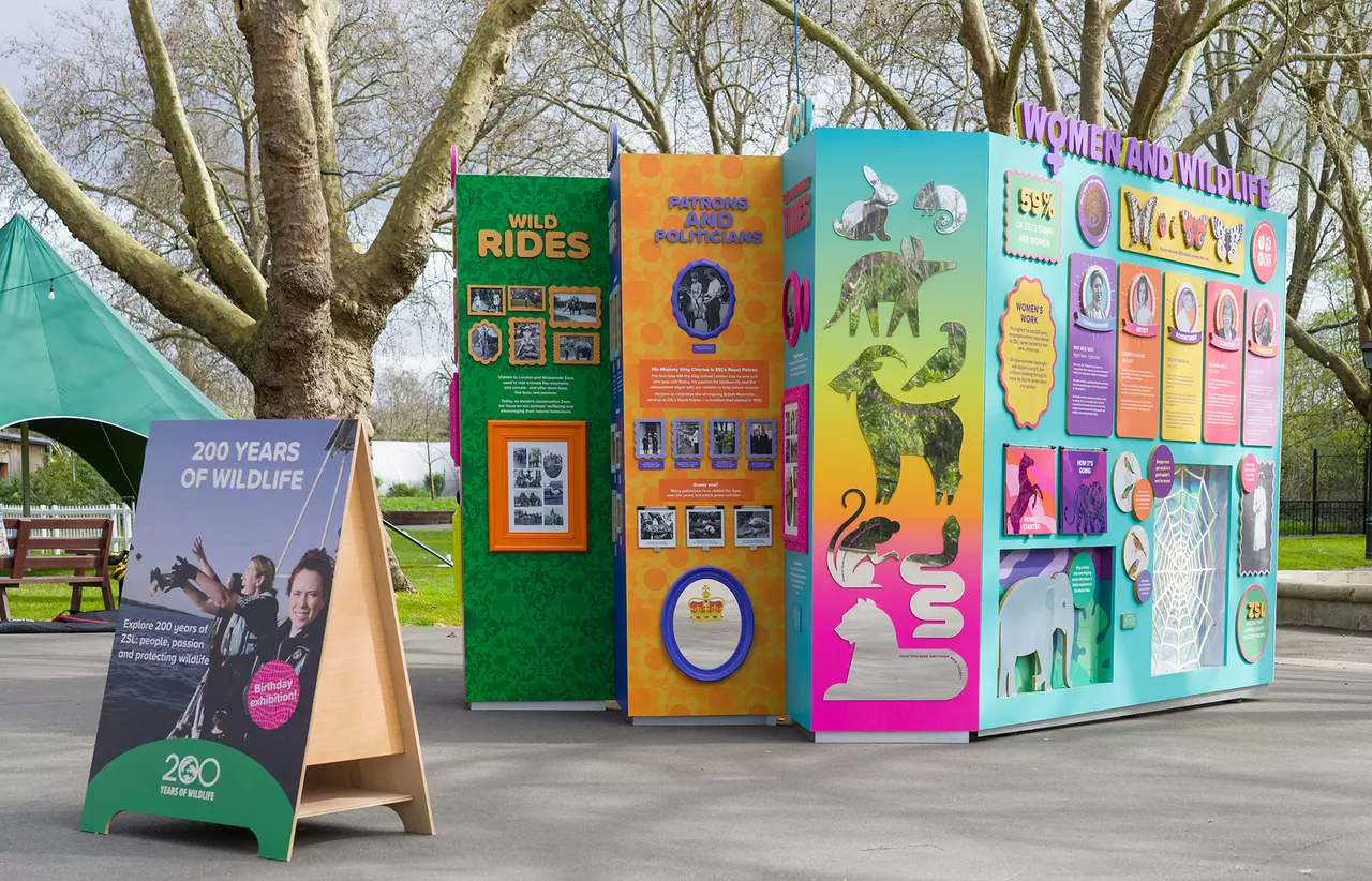 The colourful ZSL at 200 Exhibition at London Zoo with trees in the background