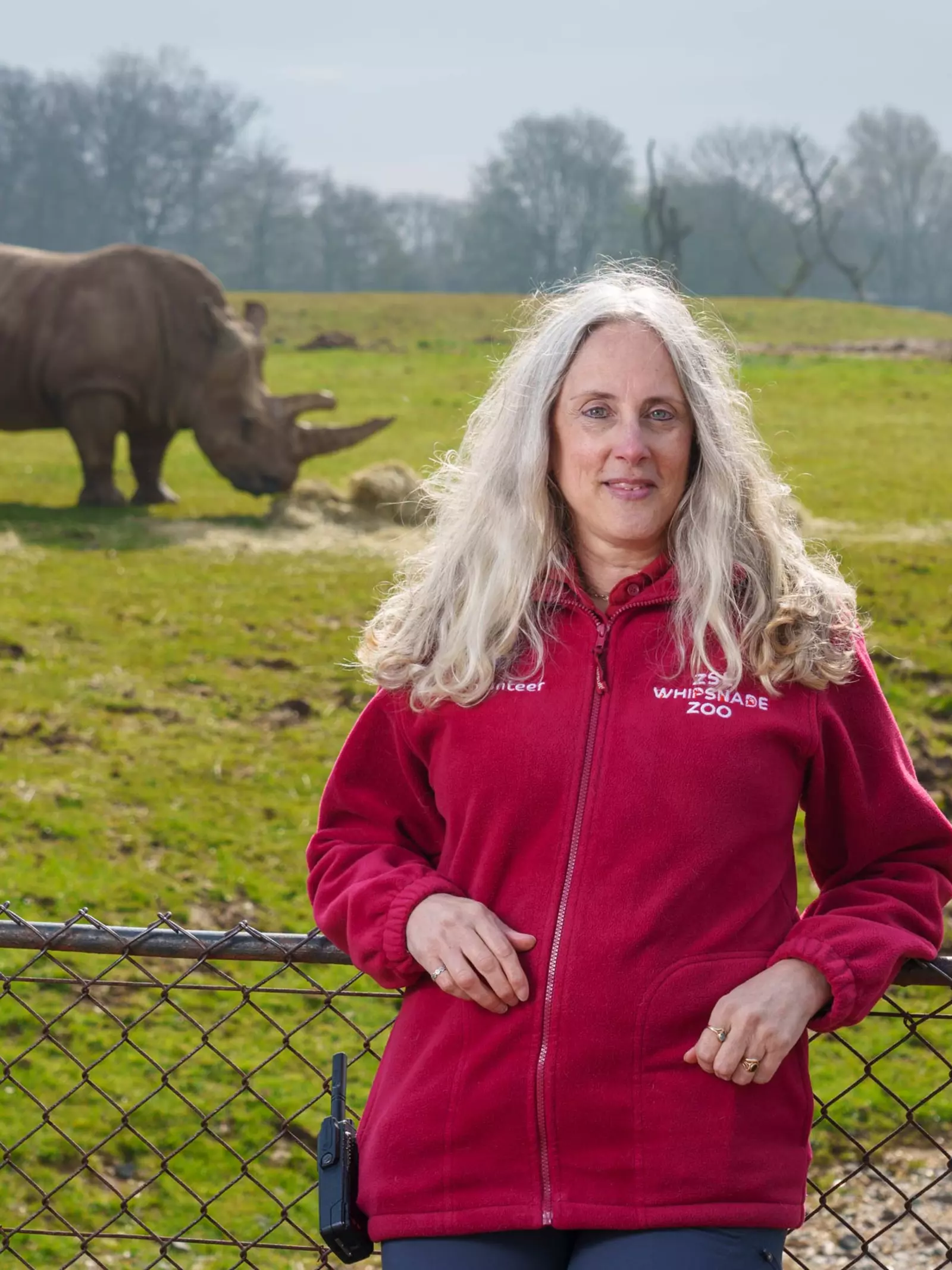 White rhinos and Whipsnade zoo volunteer Caroline 