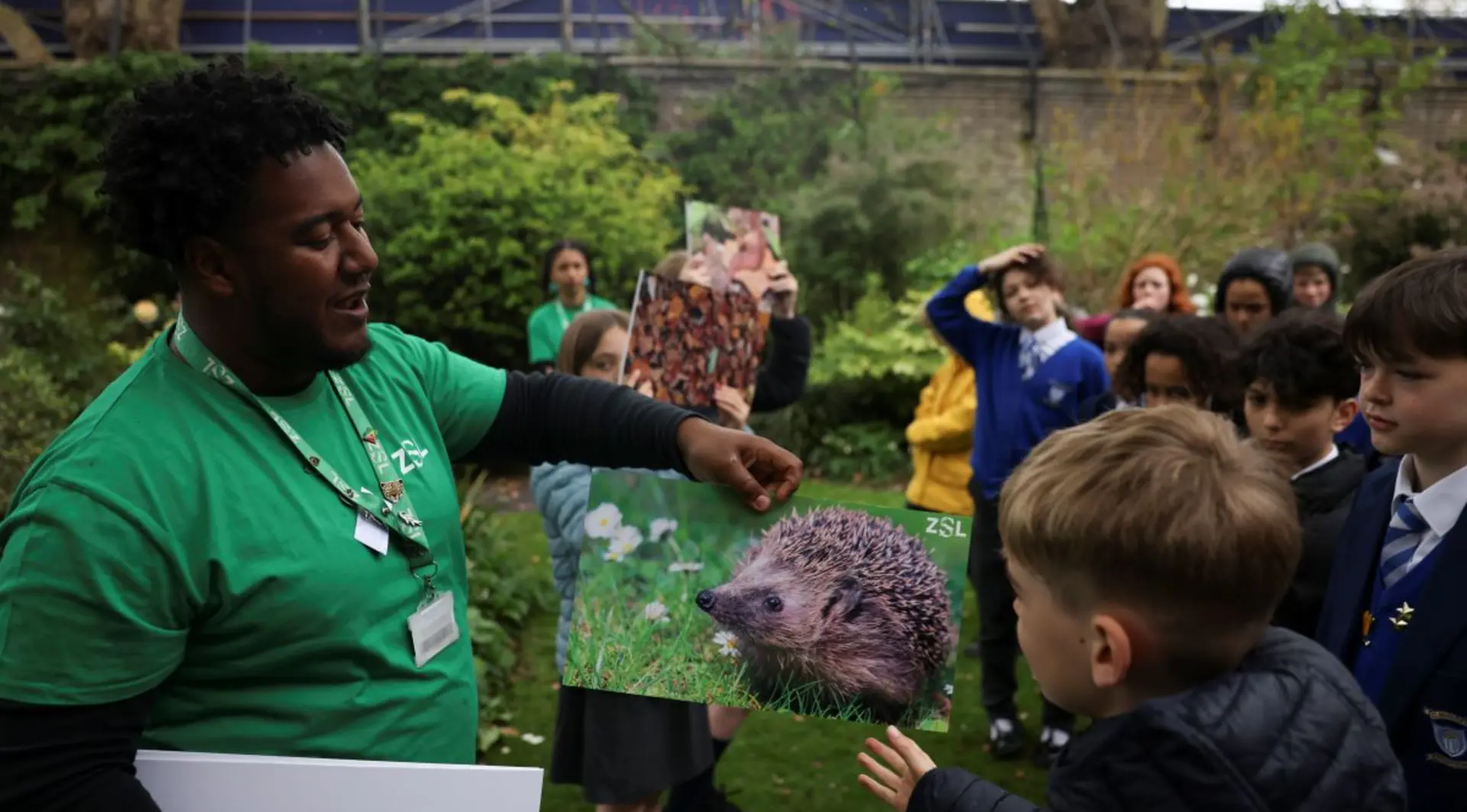 An educator teaching outdoors