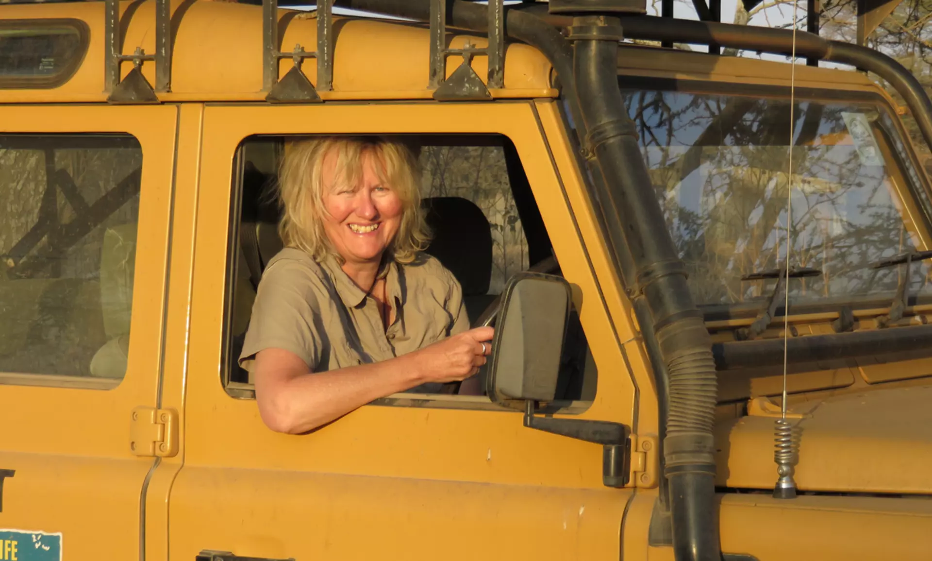 Sarah Durant, ZSL, sat in a jeep