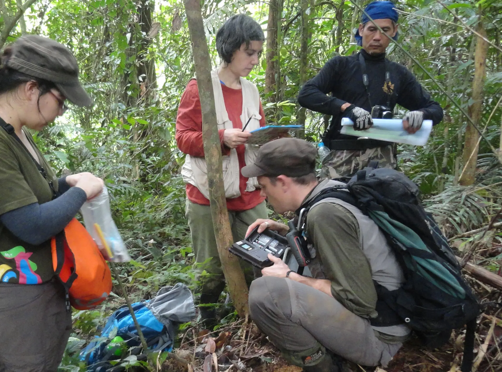 A group of people Setting up camera traps in Khlong Nakha Wildlife Sanctuary