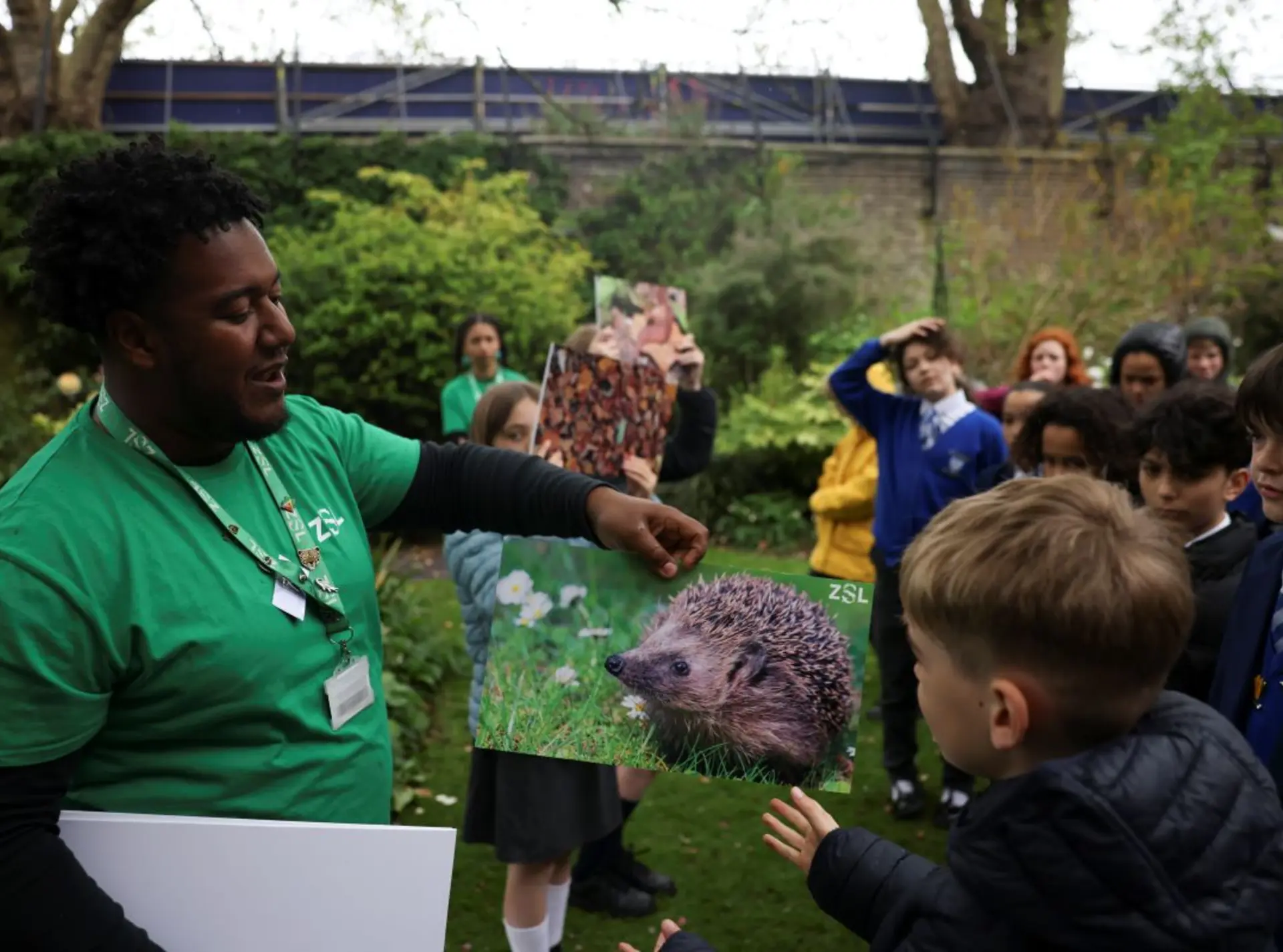 An educator teaching outdoors