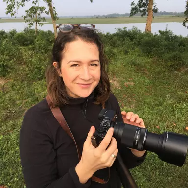 Dr Sophie Common, ZSL, with camera