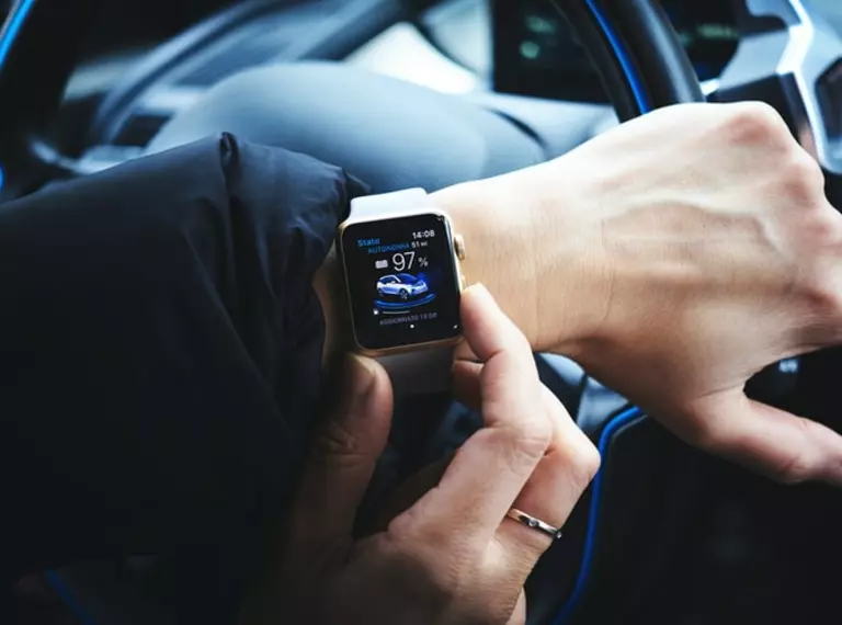 A smart watch on a wrist is an example of a miniature device