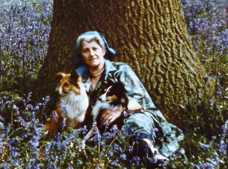 Miriam Rothschild with two dogs