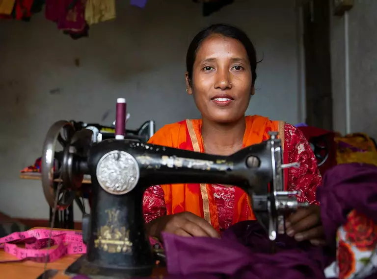 tailor in India with sewing machine