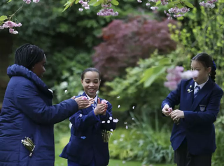Children create seed capsules in the gardens of Downing Street