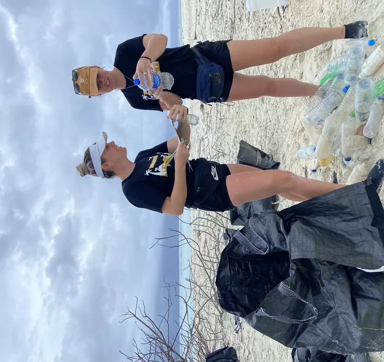 ZSL conservationists collecting washed up plastic bottles for analysis