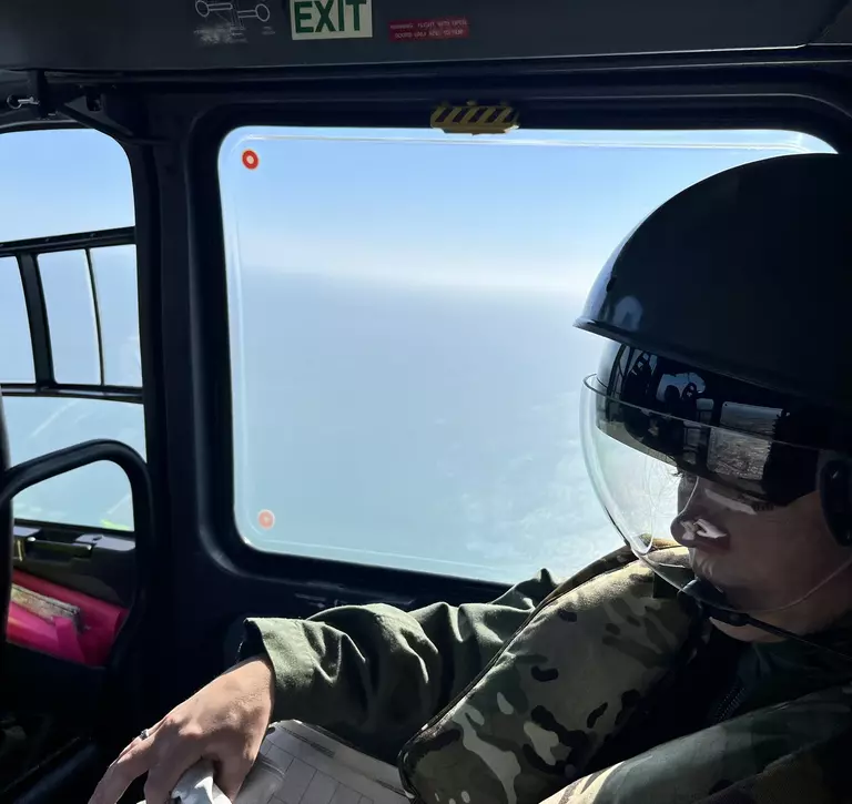 Hannah McCormick in helicopter during seal survey