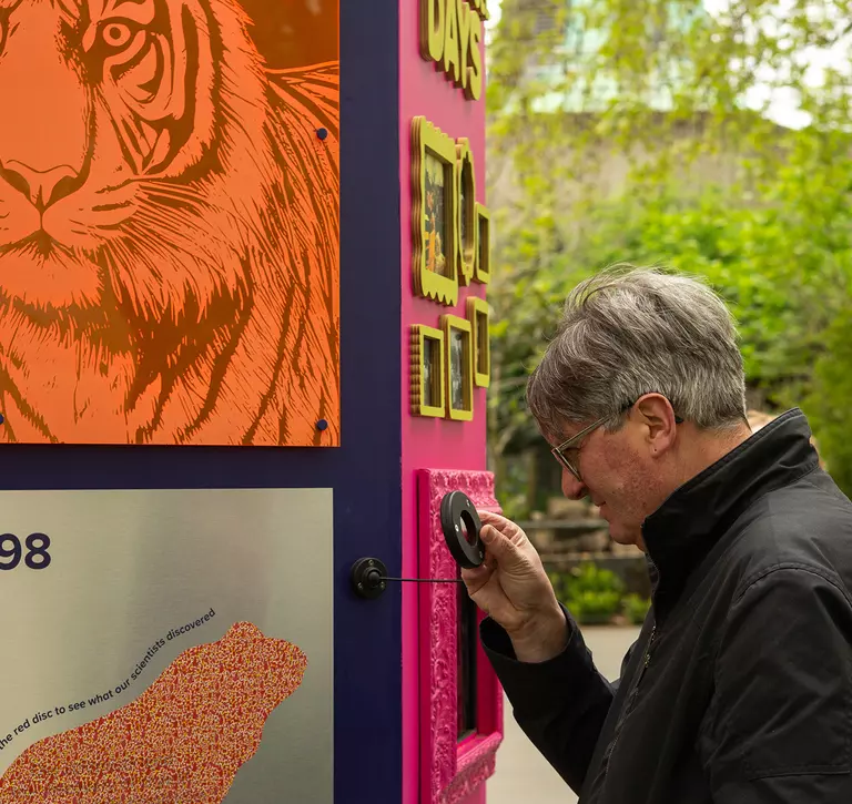 Poet Laureate Simon Armitage at ZSL looking at the 200 Exhibition at London Zoo